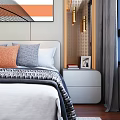 Double Bed with White Gray Orange Pillows Black Lamp on Nightstand and Decorative Wall Art