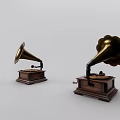 Two Vintage Gramophone Sound Systems with Brass Horns and Wooden Bases