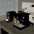 Modern Dark Gray Coffee Machines As Kitchen Appliances On Tabletop With Coffee Cup And Bag