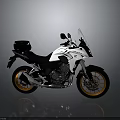 Stylish White Adventure Motorcycle With Black Seat Orange Wheels And Rear Box Design