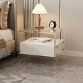 Transparent Frame Bedside Table with Wooden Drawer Alarm Clock Books and Table Lamp in Bedroom