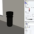 Modern Black Art Installation With Cylindrical Design And Geometric Laser Cut Pattern