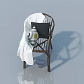 Wicker Chair With White Blanket And Pillows Featuring Reflection On Light Blue Background