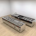 Professional Commercial Kitchen Interior With Stainless Steel Workstation Stovetops Cabinets And White Walls