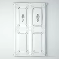 Vintage Blue Wooden Door With Distressed Paint And Carved Leaf Patterns