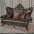 Ornate Carved Leather Double Sofa With Orange Patterned Pillows On Wooden Floor And Patterned Rug