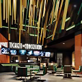 Cinema Lobby Interior Design With Tickets Concession Counter Seating Area Green Yellow Decorative Chandeliers