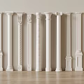 Various Designed White Decorative Columns With Carved Details In Interior Space