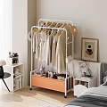 White Clothing Rack With Hanging Clothes Orange Drawer And Plush Toys For Bedroom Storage