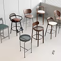 Modern Bar Stools With Various Designs Metal Frames And Colored Seats In Display Space