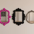 Three Decorative Mirrors With Pink Black Silver Ornate Frames Hanging On Wall 3d model