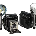 Vintage Large Format Cameras With Round Flash Units And Retro Design