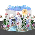 Floral Installation Featuring Transparent Cube Structure With Colorful Flowers And Decorative Leaves