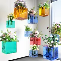 Colorful Transparent Cube Vases Hanging And Filled With Fresh Flowers For Decor