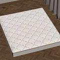 White Quilted Mattress With Diamond Stitch Pattern On Wooden Floor