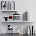 Modern Interior Bookshelf Display With Inflatable Decor And Book Collection 3d model