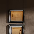 Abstract Paintings Hanging on Wooden Background Wall with Square Ornate Frames and Geometric Line Elements