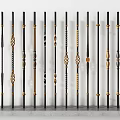 Decorative Metal Railings with Various Black and Gold Design Patterns and Ornate Details