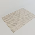 Beige Square Rug With Subtle Geometric Pattern On Clean White Floor In Minimalist Space
