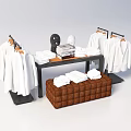 Clothing Display Shelves With Hanging White Garments Folded Clothes And Brown Padded Table