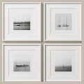 Four Minimalist White Picture Frames with Black and White Boat Photos Hanging on Wall