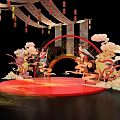 Traditional Stage With Red Circular Platform Archway Cloud Decorations Female Figures Lanterns And Banner 3d model