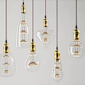 Hanging Vintage Pendant Lights With Various Shapes Transparent Glass Bulbs And Gold Accents