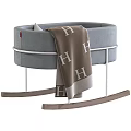 Gray Rocking Baby Crib With Metal Frame Wooden Rockers Star Patterned Pillows And Striped Blanket