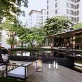 Tranquil Residential Landscape With Lush Trees Green Lawn Stone Pathway And Seating Area