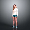 A woman wearing white long-sleeve top blue denim shorts light blue shoes against gray background