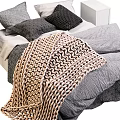 Stylish Double Bed With Gray Bedding Knitted Blanket And Black Beige Pillows