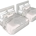 Two Modern Double Beds With Light Gray Headboards White Pillows And Gray Blankets
