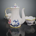 White Ceramic Tea Set With Blue Red Floral Patterns And Yellow Rim Teacups