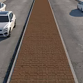Road Infrastructure With Central Brick Paved Strip Between Traffic Lanes And Cars