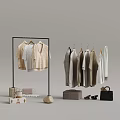 Modern Clothing Display With Hanging Shirts Cardigans And Accessories Including Handbag Shoes
