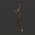 Man Holding Palette Wearing Painted Overalls Standing Barefoot Against Gray Background
