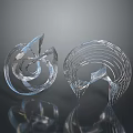 Transparent Glass Sculptures With Spiral Shapes On Black Background And Reflective Surfaces
