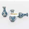 Ceramic Vases With Blue And White Floral Patterns Displayed On White Background 3d model