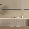 Modern Minimalist Kitchen Island With Stone Countertop Faucet White Vase Twigs And Black Strip
