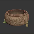 Ornate Brass Ashtray Featuring Intricate Carved Rose Patterns And Decorative Feet