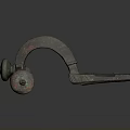 Ancient Bronze Household Item With Curved Design Rustic Patina And Decorative Wheels