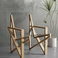 Wooden Frame Leisure Chairs With Transparent Seat Against Gray Wall And Green Plant