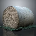 Net Wrapped Hay Bale With Dry Grass And Green Grass Base On Gray Background