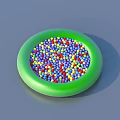 Round Green Bowl Filled With Colorful Small Balls For Household Use