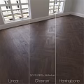 Dark Brown Herringbone Wooden Flooring With Natural Light In Interior Space