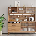 Modern Wooden Sideboard With Drawers Glass Doors And Kitchen Items Near Green Plant