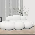 Cloud Shaped Irregular Sofa in Modern Room with Wooden Floor White Curtains and Green Plant
