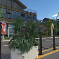 Roadside Facilities Including Bollards Chain Barriers Planters And Information Signs Near Buildings