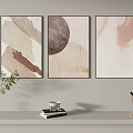 Abstract Paintings Hanging On Wall With Vase Books Cup And Stuffed Toys