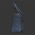 Blue Textured Leather Handbag With Circular Pattern And Handheld Handle Design